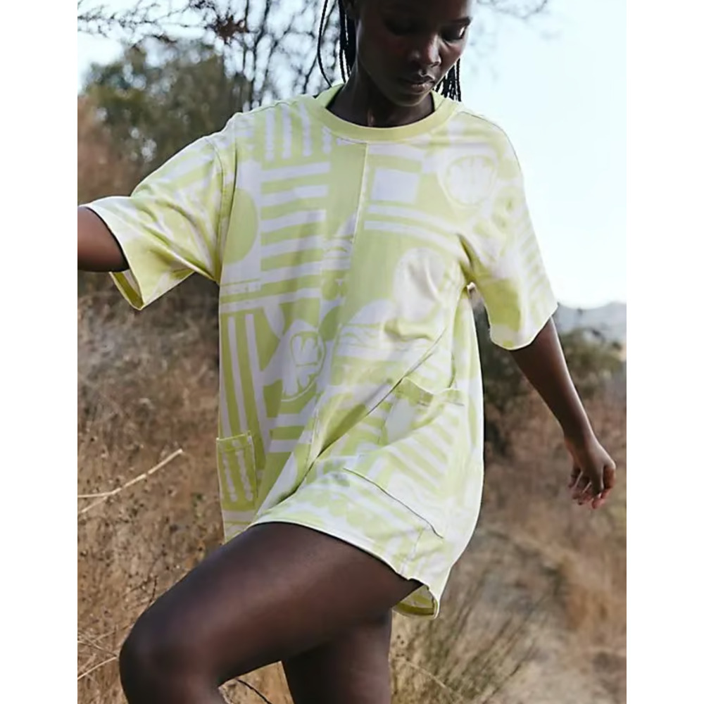 NEW FREE PEOPLE FP MOVEMENT YELLOW PRINTED HOT SHOT TEE ONE PIECE ROMPER SZ XS